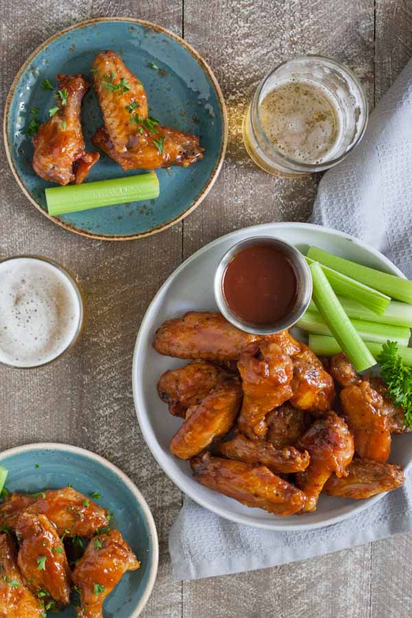 Bourbon and Honey Baked Chicken Wings | BourbonandHoney.com -- These Bourbon and Honey Baked Chicken Wings are sticky, messy, boozy and oh so flavorful! They're perfect for game day, or any-day!