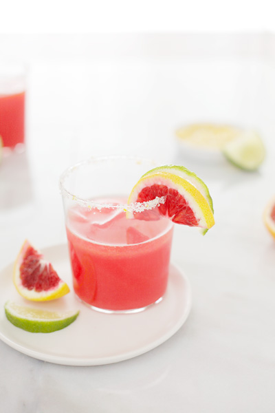 Blood Orange Margaritas | BourbonandHoney.com -- Tequila and blood orange juice make these Blood Orange Margaritas fresh, delicious and fun. They're perfect for any party or celebration.