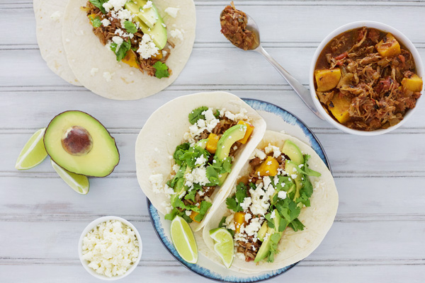 Slow Cooker Sweet Potato and Pulled Pork Tacos | BourbonAndHoney.com