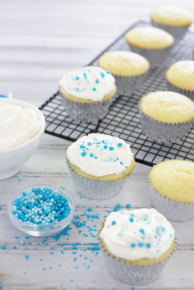 Vanilla Bean Cupcakes with Fluffy White Frosting | BourbonandHoney.com