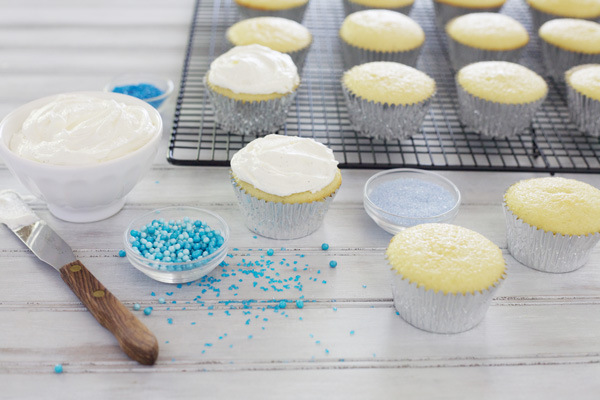 Vanilla Bean Cupcakes with Fluffy White Frosting | BourbonandHoney.com