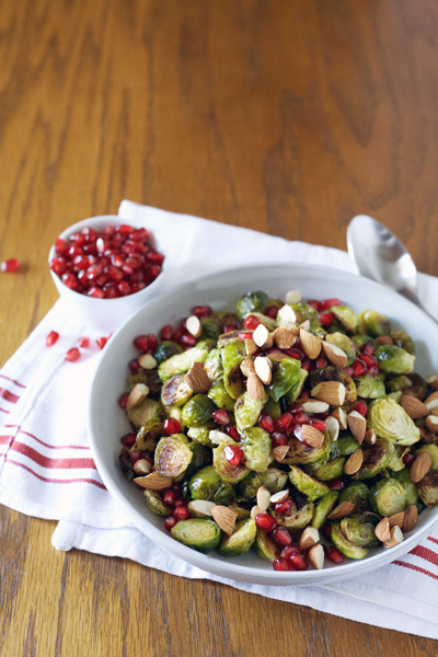 Roasted Brussels Sprouts with Pomegranate and Almonds | BourbonandHoney.com