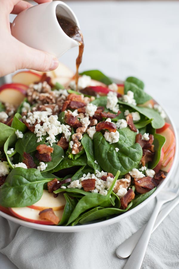 Apple, Blue Cheese and Bacon Chop Salad | BourbonandHoney.com -- This chopped bacon and blue cheese salad is packed with fresh apples, crumbled blue cheese, crispy bacon topped with a dijon vinaigrette.