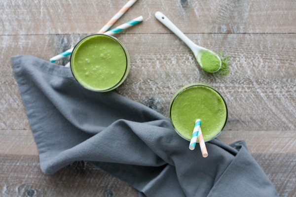 Coconut Banana Matcha Smoothie | BourbonandHoney.com -- Energizing, slightly sweet and totally delicious, this Coconut Banana Matcha Smoothie is a great on-the-go breakfast.