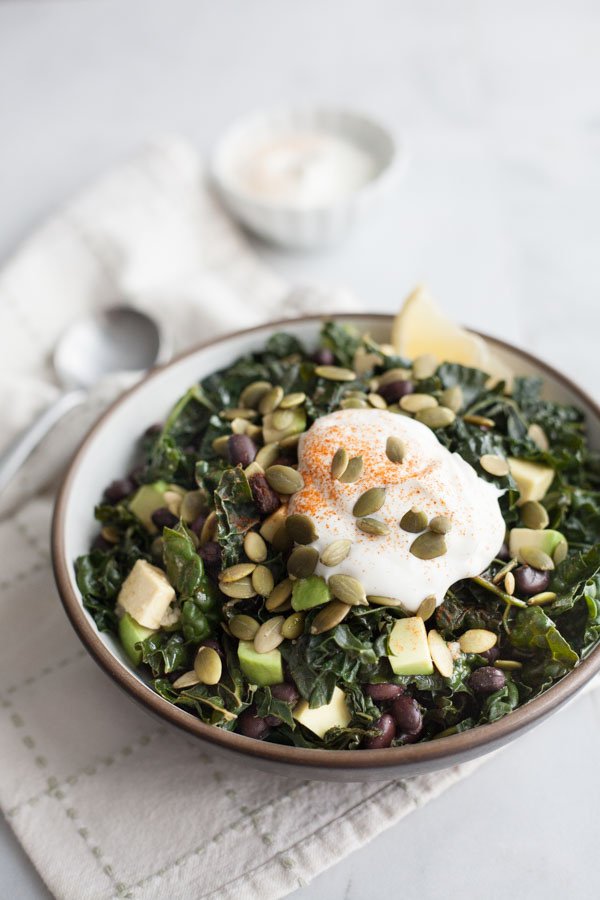 Greens and Black Beans | BourbonandHoney.com -- This big bowl of Greens and Black Beans is hearty, fresh and nourishing. Serve it for a light lunch or stuffed it in a tortilla with roasted veggies.