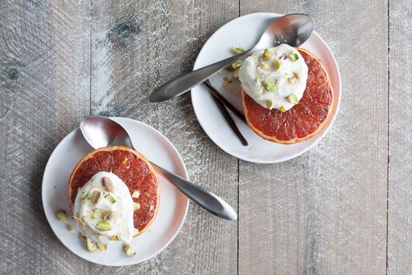 Broiled Grapefruit with Honey Yogurt and Pistachios | BourbonandHoney.com -- Fresh, citrusy and caramelized, this Broiled Grapefruit with Honey Yogurt is a delicious breakfast, snack or sweet treat.