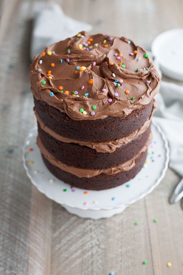 Chocolate Birthday Cake | BourbonandHoney.com -- Tall, dark, chocolatey and delicious this chocolate birthday cake is impressive and the perfect way to celebrate!