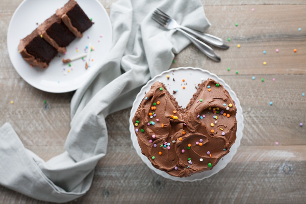 Chocolate Birthday Cake | BourbonandHoney.com -- Tall, dark, chocolatey and delicious this chocolate birthday cake is impressive and the perfect way to celebrate!