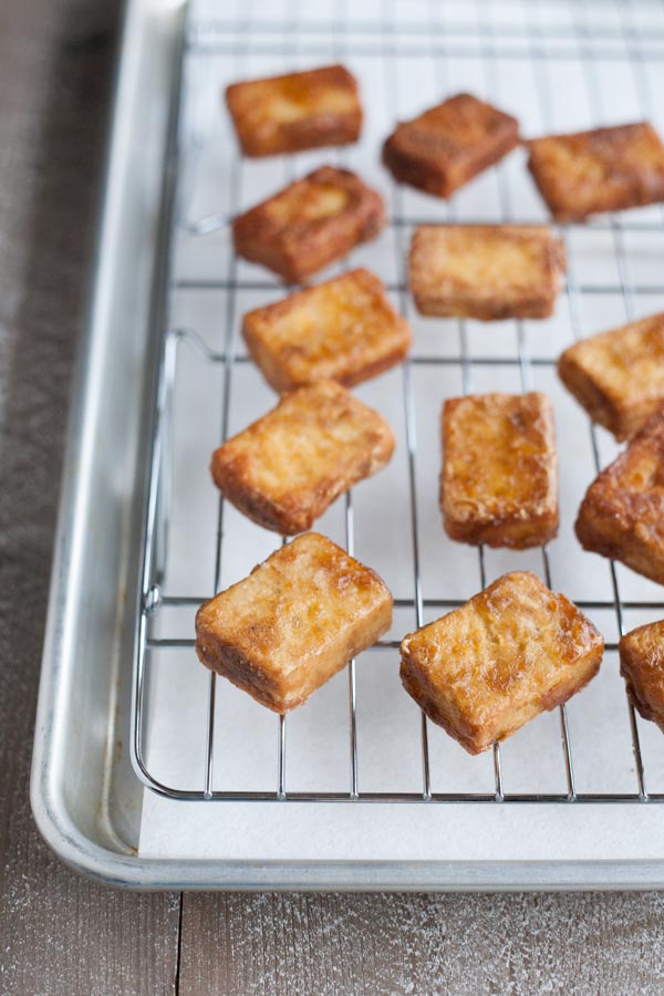 Crispy Marinated Tofu | BourbonandHoney.com -- Spicy and savory, this Crispy Marinated Tofu is a flavorful and delicious way to serve a vegetarian favorite.