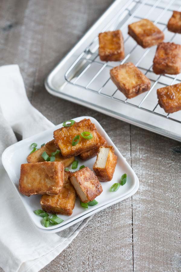 Crispy Marinated Tofu | BourbonandHoney.com -- Spicy and savory, this Crispy Marinated Tofu is a flavorful and delicious way to serve a vegetarian favorite.