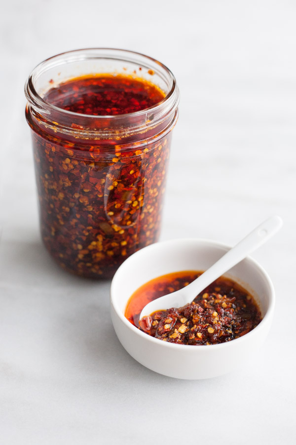 Crunchy Chile Sauce | BourbonandHoney.com -- This hot sauce is savory, spicy and totally delicious. Spoon it on everything from rice bowls to scrambled eggs, roasted veggies or nachos.