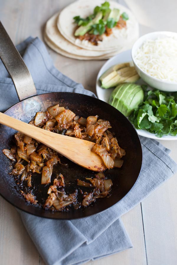 Kimchi Quesadilla | BourbonandHoney.com -- These over-the-top cheesy Kimchi Quesadillas are a deliciously greasy and spicy snack or cocktail party appetizer.