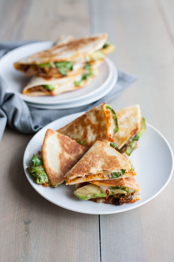 Kimchi Quesadilla | BourbonandHoney.com -- These over-the-top cheesy Kimchi Quesadillas are a deliciously greasy and spicy snack or cocktail party appetizer.