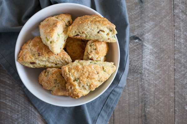 Savory Scones with Gruyère and Bacon | BourbonandHoney.com -- Flakey, buttery, cheesy and studded with bacon these Savory Scones are perfect for brunch or an afternoon snack.