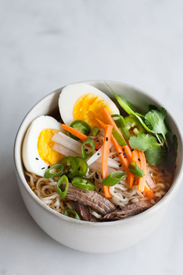 Slow Cooker Ramen | BourbonandHoney.com -- The complex flavors of ramen are made easy with this Slow Cooker Ramen recipe with all the yummy toppers you could want!