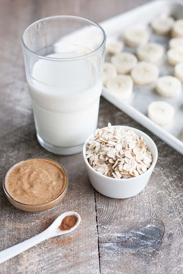 Almond Butter and Banana Oatmeal Smoothie | BourbonandHoney.com -- Slightly sweet, smooth and frosty this Almond Butter Banana Oatmeal Smoothie is the perfect breakfast treat, post workout pick-me-up or afternoon snack.