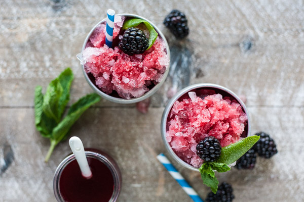 Bourbon and Honey Blackberry Lime Mint Julep | BourbonandHoney.com -- This colorful, fruity Bourbon and Honey Blackberry Lime Mint Julep packs a punch and will keep you sipping pretty all summer long!