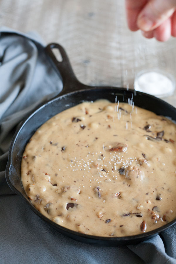 Bourbon and Honey Brown Butter Chocolate Chunk Skillet Cookie | BourbonandHoney.com -- This over-the-top Brown Butter Chocolate Chunk Skillet Cookie is spiked with Bourbon and Honey and perfect for celebrating!