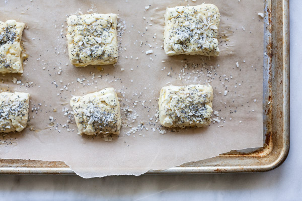 Cream Cheese Stuffed Everything Bagel Biscuits | BourbonandHoney.com -- Crunchy, salty and studded with pockets of cream cheese, these everything bagel biscuits are an impressive and delicious brunch addition.