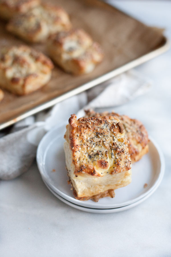 Cream Cheese Stuffed Everything Bagel Biscuits | BourbonandHoney.com -- Crunchy, salty and studded with pockets of cream cheese, these everything bagel biscuits are an impressive and delicious brunch addition.