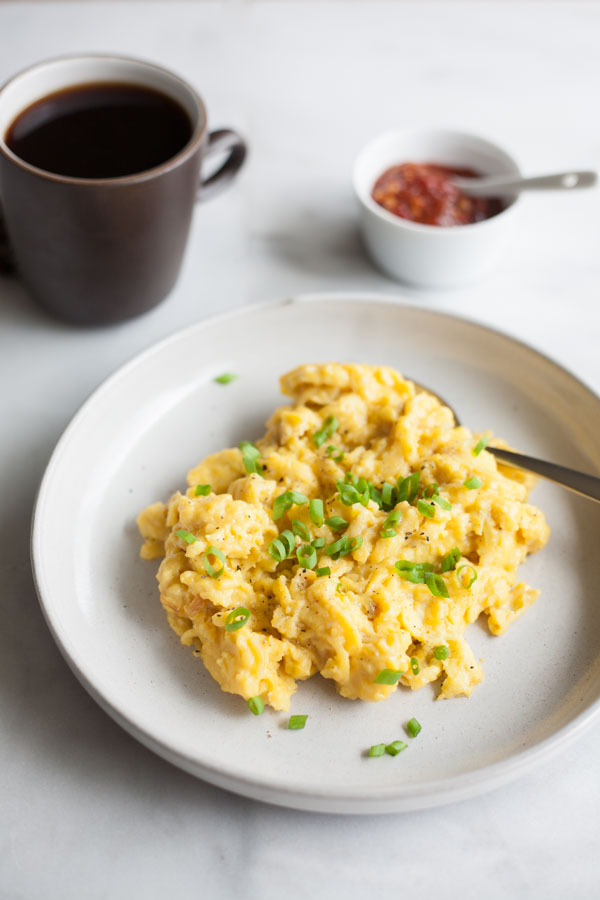 Perfect Scrambled Eggs | BourbonandHoney.com -- Breakfast or brunch is incomplete without the Perfect Scrambled Eggs to please a crowd. They're light, fluffy and delicious!