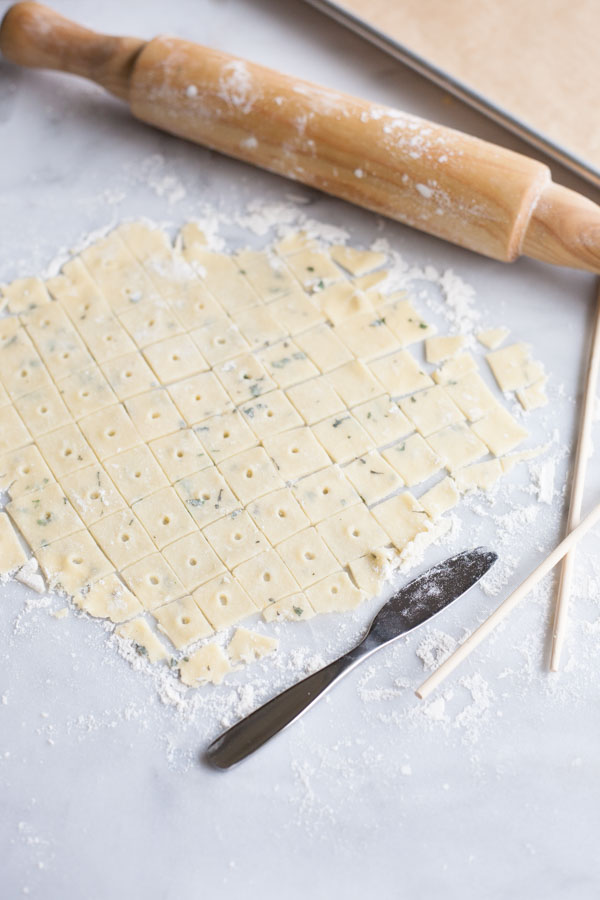 Sage and Fontina Crackers | BourbonandHoney.com -- These crunchy cheesy Sage and Fontina Crackers are totally addicting. They're slightly herby, super cheesy and totally worth making!