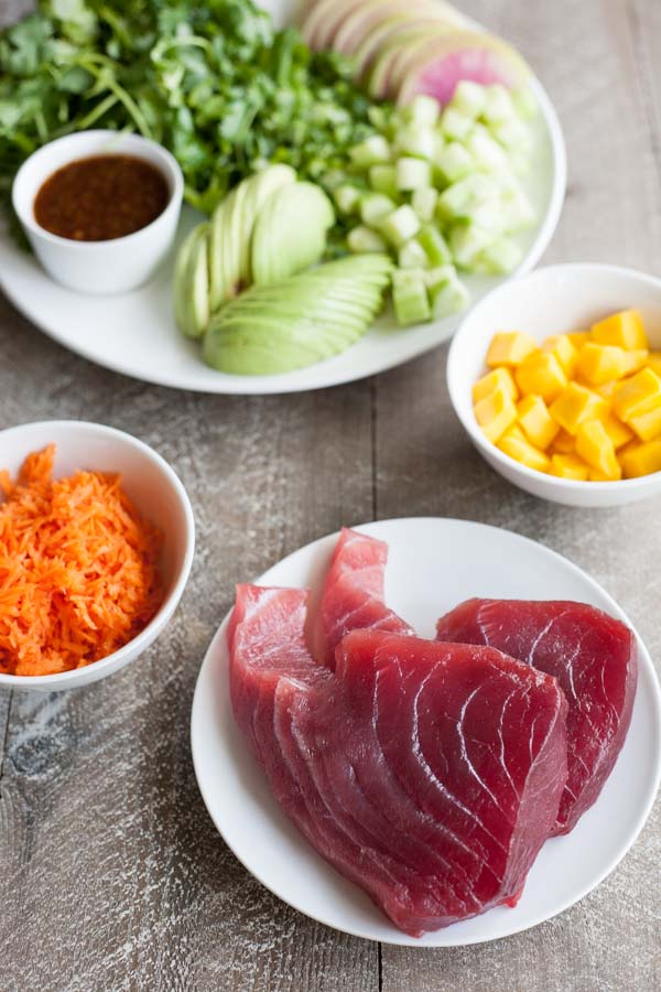 Ahi Tuna Poke Rice Bowl | BourbonandHoney.com -- This Ahi Tuna Poke Rice Bowl is straight from Hawaii! It's packed with fresh toppings and lots of tender tuna for a healthy, flavorful bowl.