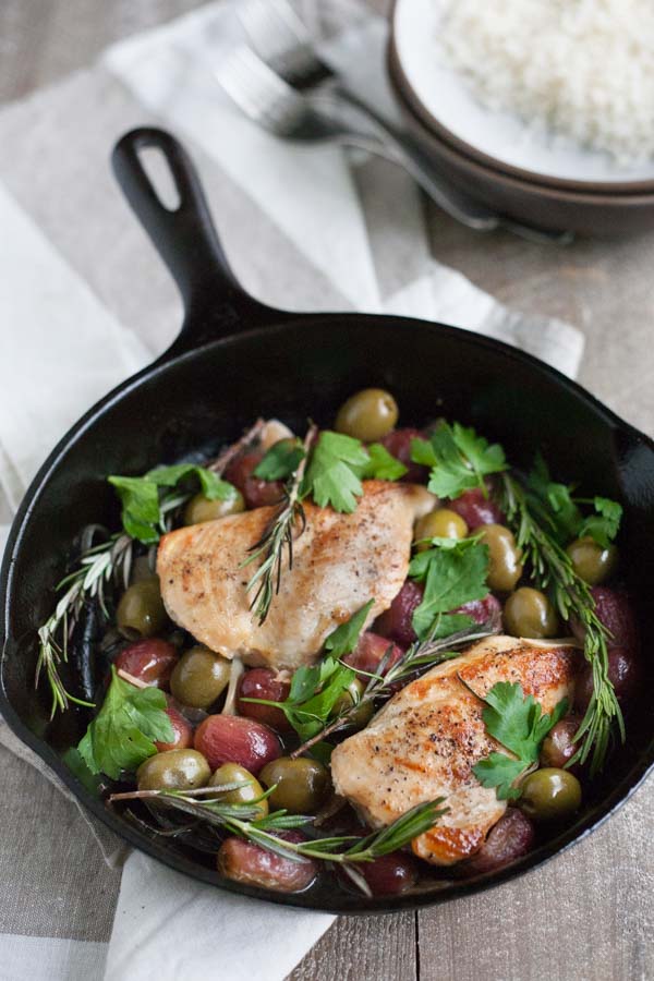 Skillet Chicken with Olives and Rosemary | BourbonandHoney.com -- This flavorful and delicious Skillet Chicken with Olives and Rosemary is an impressive dinner recipe for guests and an easy weeknight meal!