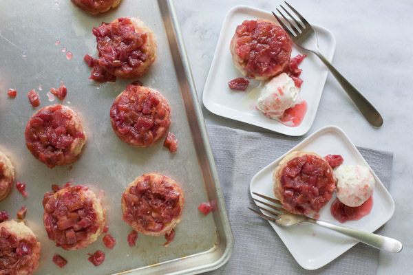 Rhubarb Upside-Down Cupcakes | BourbonandHoney.com --Tangy, tender and slightly sweet, these Rhubarb Upside-Down Cupcakes are an easy and tasty summer treat topped with ice cream!