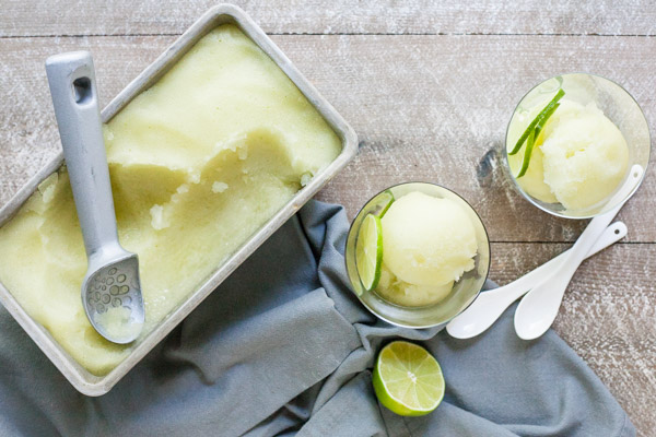 Cucumber Gin and Tonic Sorbet | BourbonandHoney.com -- This chilly and refreshing Cucumber Gin and Tonic Sorbet is the perfect icy boozy cocktail to keep cool in the summer heat.