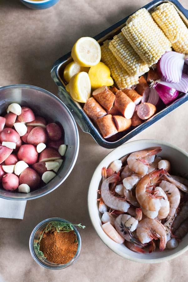 Easy Shrimp Boil | BourbonandHoney.com -- This quick and Easy Shrimp Boil is a flavorful one-pot meal fit for a crowd! It's packed with potatoes, corn, shrimp and sausage.