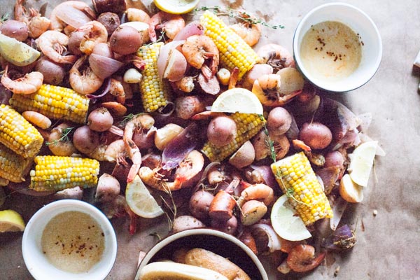 Easy Shrimp Boil | BourbonandHoney.com -- This quick and Easy Shrimp Boil is a flavorful one-pot meal fit for a crowd! It's packed with potatoes, corn, shrimp and sausage.