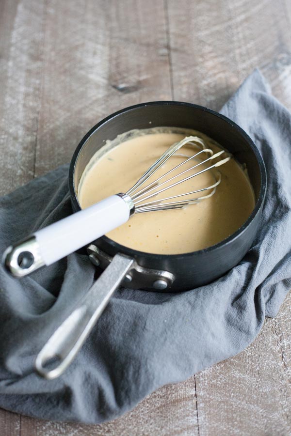 Creamy Pumpkin Alfredo Pasta with Kale | BourbonandHoney-com -- Rich, creamy and totally comforting, this Creamy Pumpkin Alfredo Pasta with Kale is a quick and flavorful weeknight dinner.