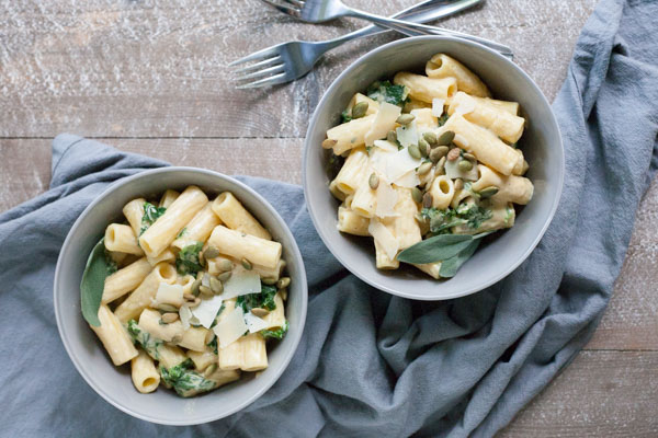 Creamy Pumpkin Alfredo Pasta with Kale | BourbonandHoney-com -- Rich, creamy and totally comforting, this Creamy Pumpkin Alfredo Pasta with Kale is a quick and flavorful weeknight dinner.