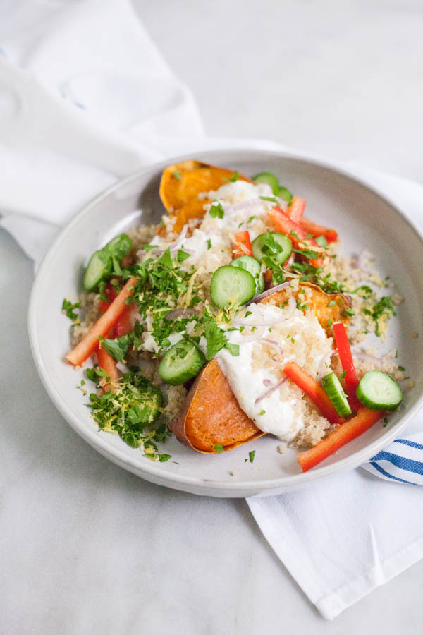 Greek Baked Sweet Potatoes | BourbonandHoney.com -- These simple Greek Baked Sweet Potatoes are a hearty, healthy and flavorful weeknight recipe or a great brown bag lunch.