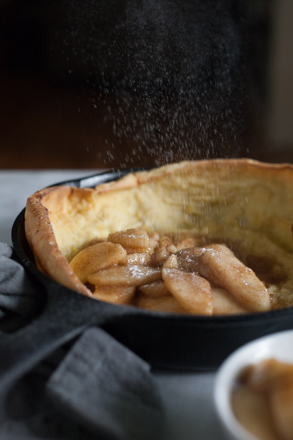 Apple Cinnamon Oven Pancake | BourbonandHoney.com -- Light and airy, this puffy Apple Cinnamon Oven Pancake is the perfect breakfast recipe, for your favorite fall apples or fresh fruit!