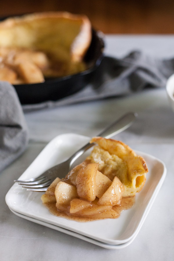 Apple Cinnamon Oven Pancake | BourbonandHoney.com -- Light and airy, this puffy Apple Cinnamon Oven Pancake is the perfect breakfast recipe, for your favorite fall apples or fresh fruit!