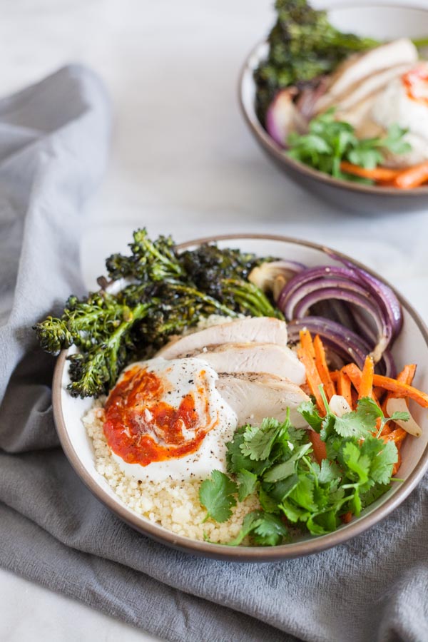 Moroccan Chicken Couscous Bowls | BourbonandHoney.com -- Spicy, quick and easy these Moroccan Chicken Couscous Bowls are the perfect flavorful weeknight dinner or hearty weekend lunch.