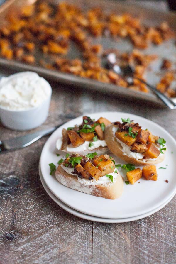 Butternut Squash Crostini with Whipped Goat Cheese | BourbonandHoney.com -- This seasonal and super savory Butternut Squash Crostini with Whipped Goat Cheese is the perfect holiday appetizer or party snack.