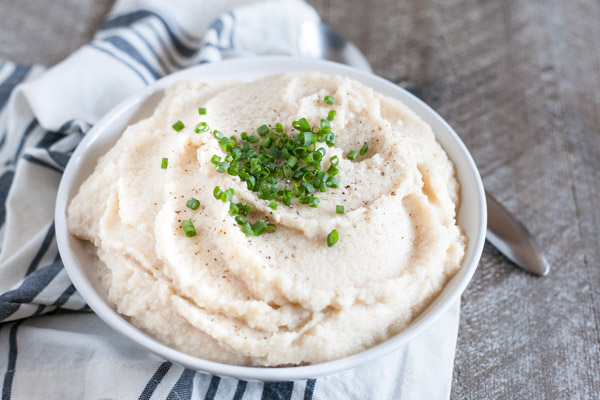 White Bean and Cauliflower Mash | BourbonandHoney.com -- Quick, easy and light, this White Bean and Cauliflower Mash is a deliciously healthy swap for traditional Mashed Potatoes!