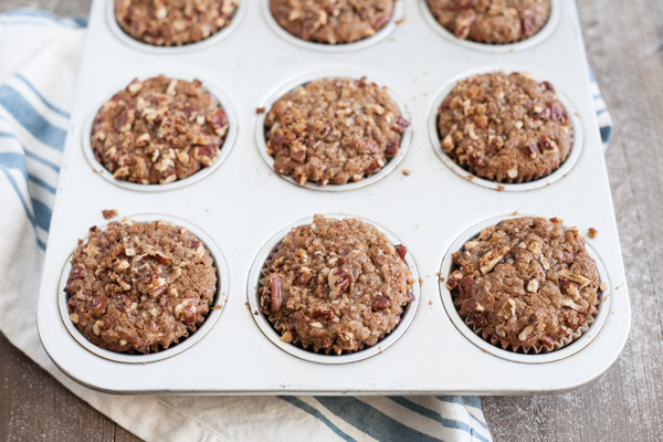 Gingerbread Muffins with Ginger Pecan Crumble | BourbonandHoney.com -- These melt-in-your-mouth Gingerbread Muffins with Ginger Pecan Crumble are seriously flavorful and perfect for breakfast, brunch or a sweet snack!