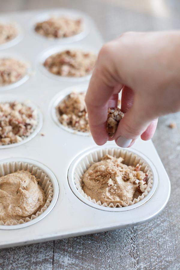 Gingerbread Muffins with Ginger Pecan Crumble | BourbonandHoney.com -- These melt-in-your-mouth Gingerbread Muffins with Ginger Pecan Crumble are seriously flavorful and perfect for breakfast, brunch or a sweet snack!