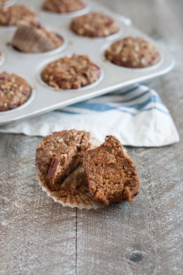 Gingerbread Muffins with Ginger Pecan Crumble | BourbonandHoney.com -- These melt-in-your-mouth Gingerbread Muffins with Ginger Pecan Crumble are seriously flavorful and perfect for breakfast, brunch or a sweet snack!