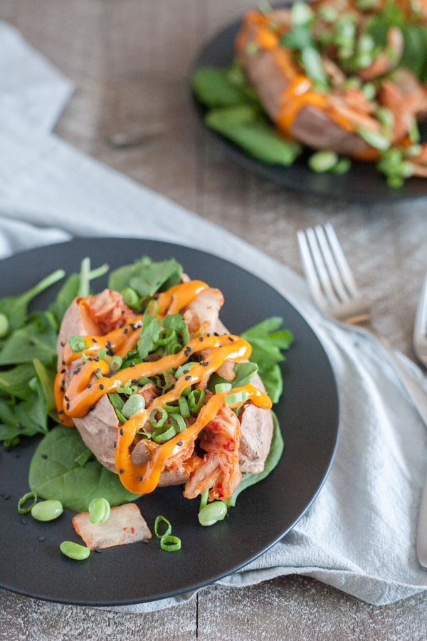 Kimchi Stuffed Baked Sweet Potatoes | BourbonandHoney.com -- These simple Spicy Kimchi Stuffed Baked Sweet Potatoes are a fun and flavorful veggie packed dinner or desk lunch recipe!