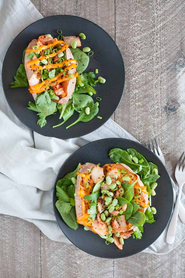 Kimchi Stuffed Baked Sweet Potatoes | BourbonandHoney.com -- These simple Spicy Kimchi Stuffed Baked Sweet Potatoes are a fun and flavorful veggie packed dinner or desk lunch recipe!