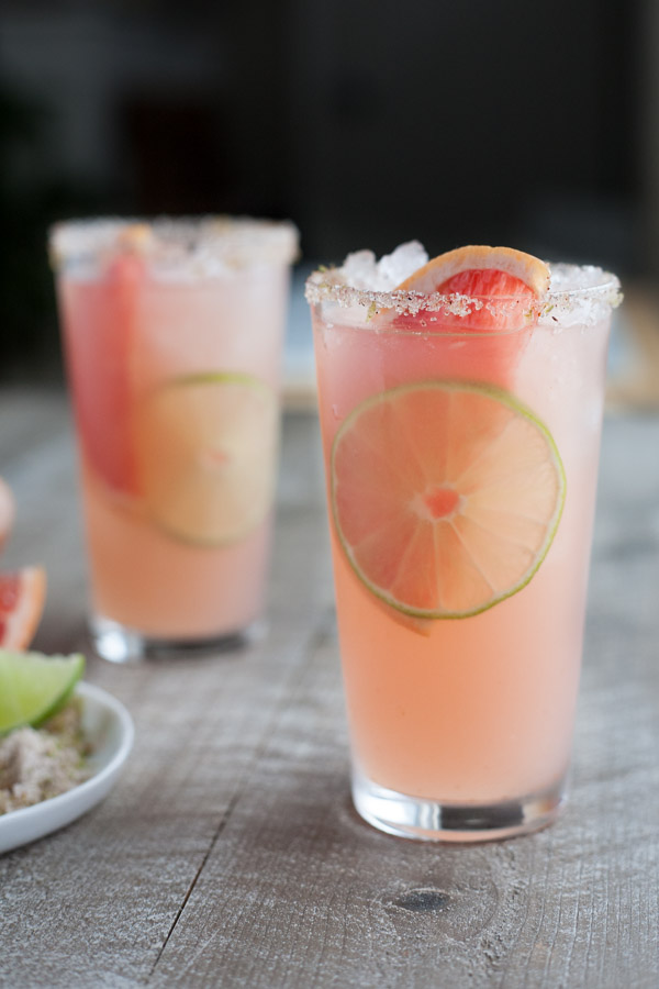 Paloma Cocktail with Chili Lime Salt | BourbonandHoney.com -- Fresh, citrusy and boozy, this bubbly Paloma Cocktail is a refreshing tequila drink with chili lime salt, it packs a punch!