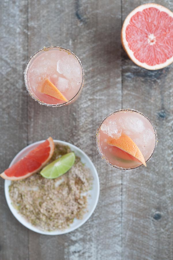 Paloma Cocktail with Chili Lime Salt | BourbonandHoney.com -- Fresh, citrusy and boozy, this bubbly Paloma Cocktail is a refreshing tequila drink with chili lime salt, it packs a punch!