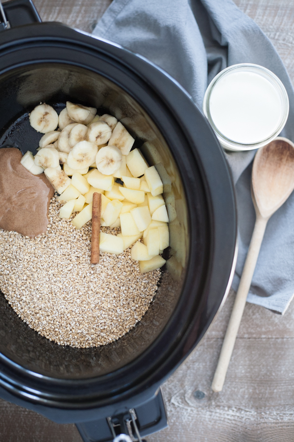 Slow Cooker Apple Cinnamon Steel Cut Oatmeal | BourbonandHoney.com -- Busy mornings are made simple with this Slow Cooker Apple Cinnamon Steel Cut Oatmeal recipe! Let it cook overnight and have breakfast ready for the week!