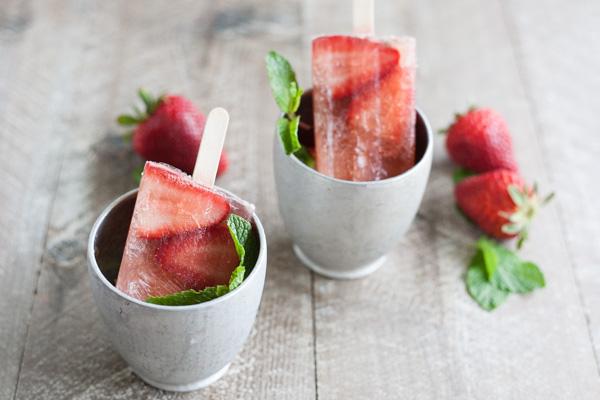 Bourbon and Honey Strawberry Mint Julep Popsicles | BourbonandHoney.com Square -- Frozen, boozy and super summery, these Bourbon and Honey spiked Strawberry Mint Julep Popsicles are going to be a keeper!