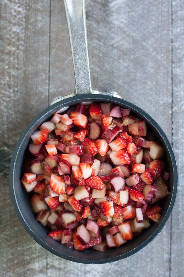 Easy Strawberry Rhubarb Turnovers | BourbonandHoney.com -- Sweet, tart and perfectly flaky these Strawberry Rhubarb Turnovers are a deliciously easy spring treat or brunch recipe!